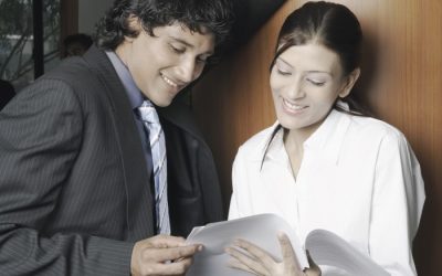 What are the pros and cons of working with a ghostwriter?