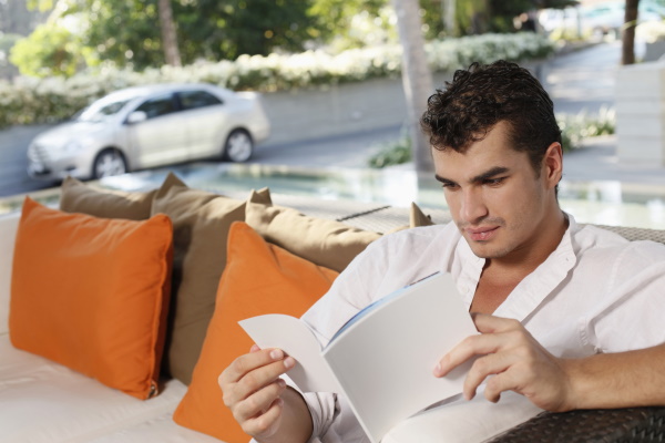 man reading book