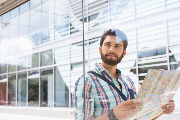 man holding map