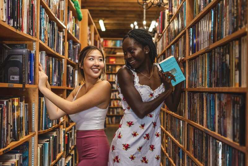 two women in library
